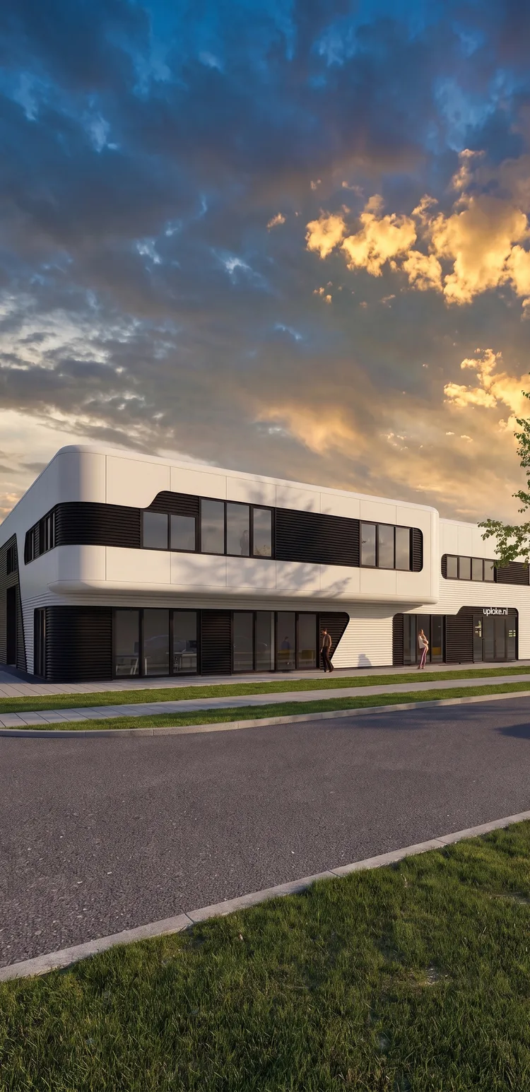 Bedrijvenpand Uplake in avondlicht op bedrijventerrein De Veken in Opmeer