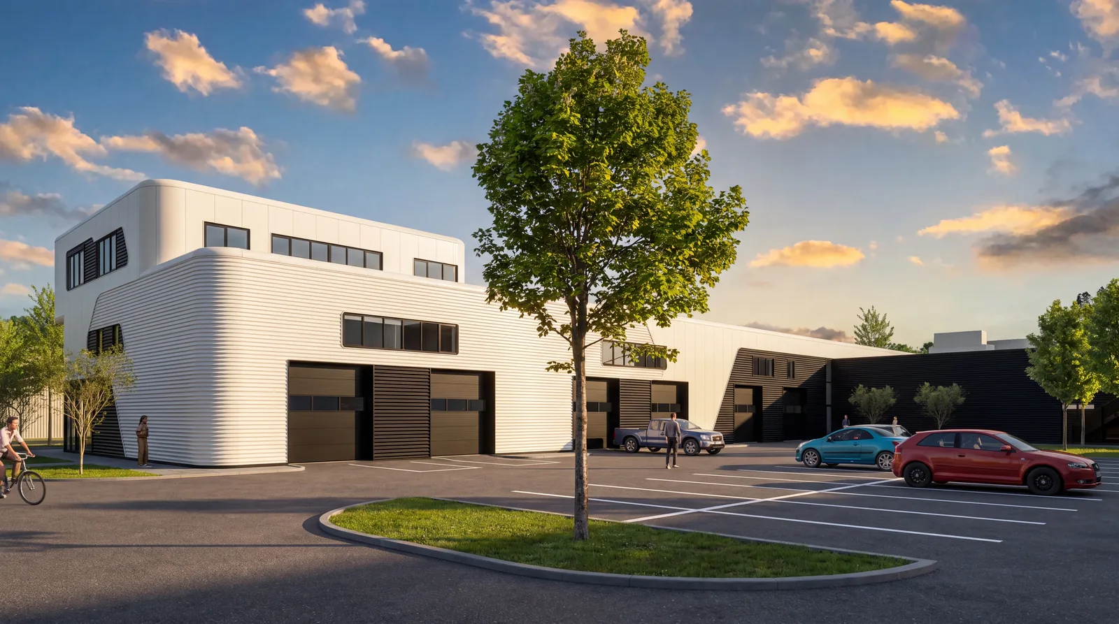 Achterzijde van het pand met elektrische roldeuren en parkeerterrein